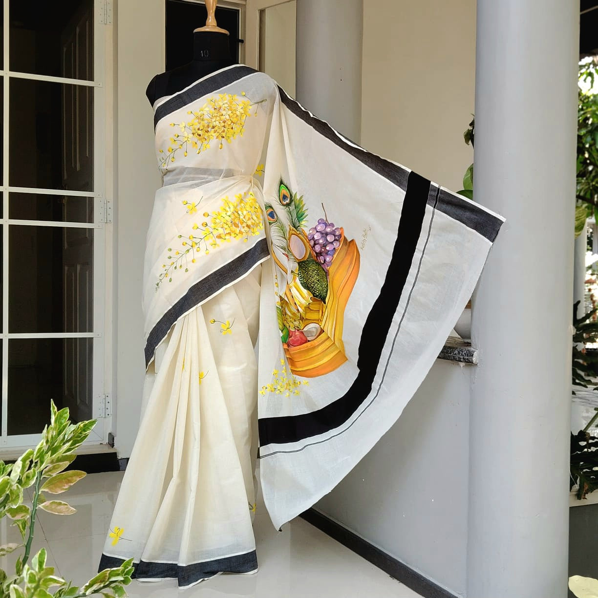 Hand-Painted Kerala Saree with Vishu Themed Motif