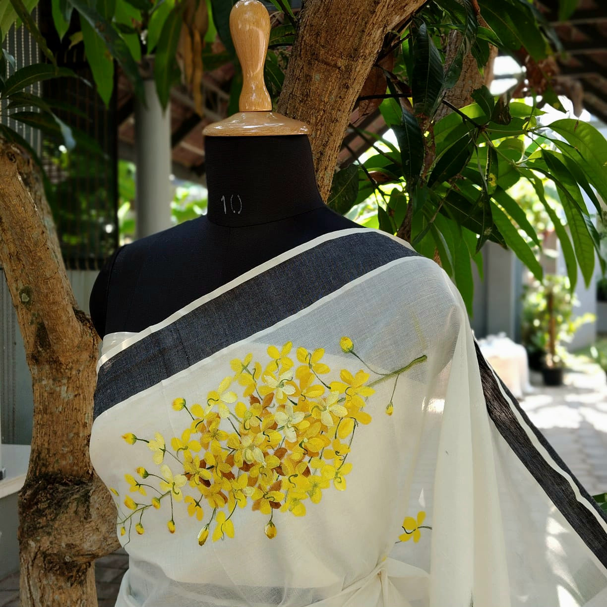 Hand-Painted Kerala Saree with Vishu Themed Motif
