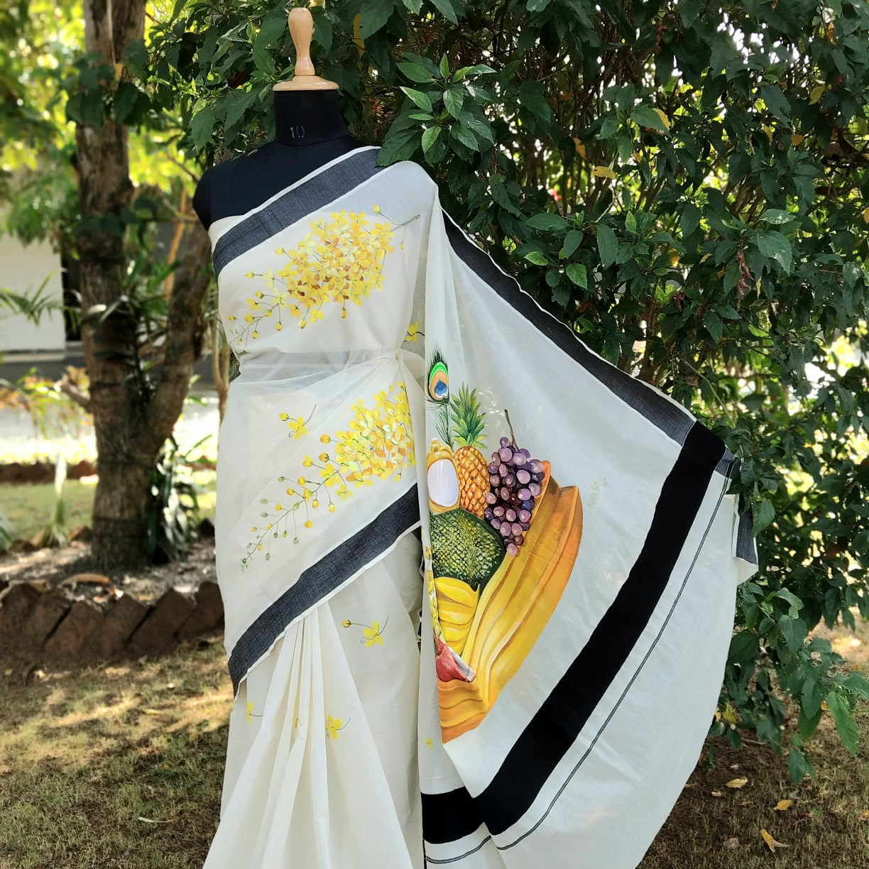 Hand-Painted Kerala Saree with Vishu Themed Motif