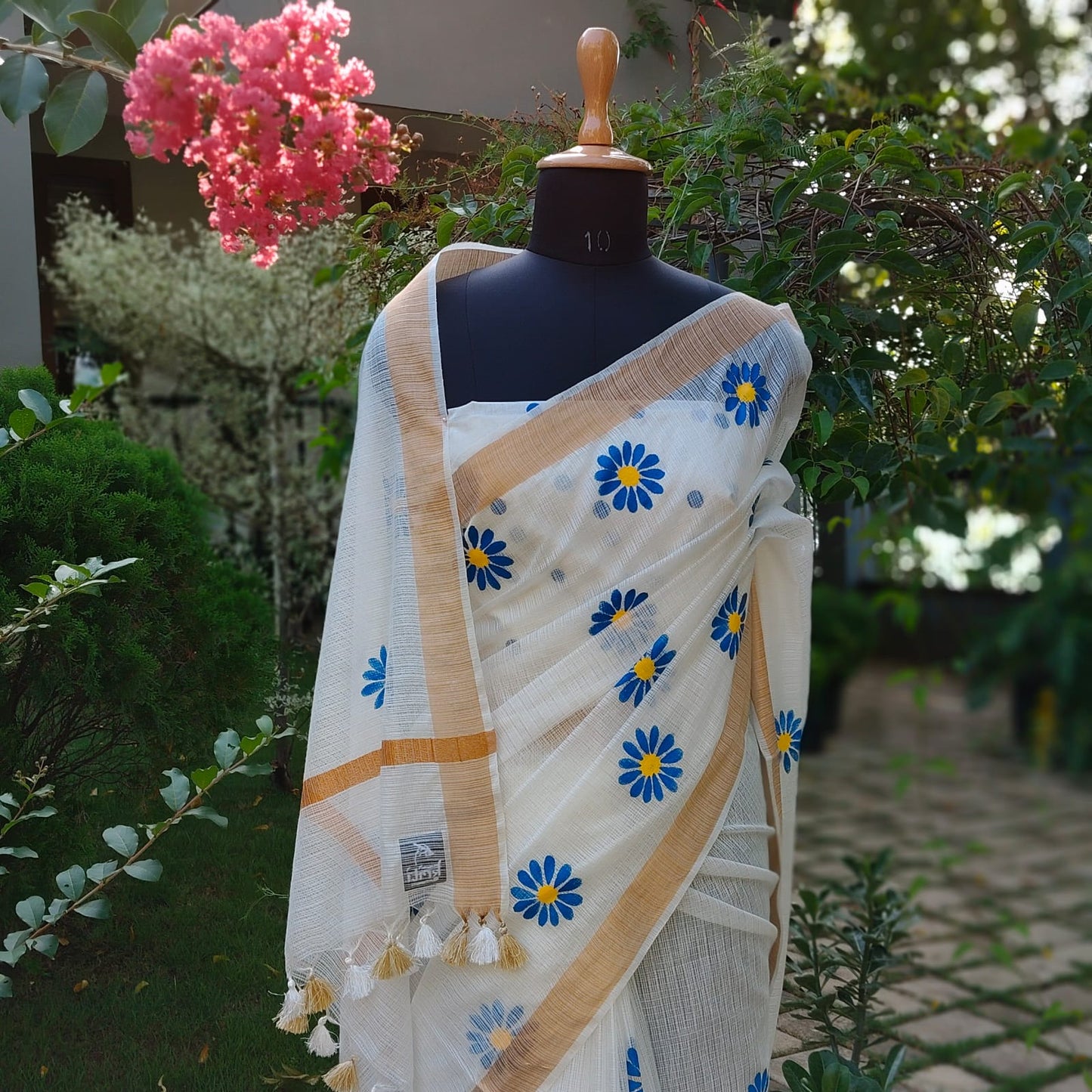 Graceful Hand-Painted Floral Saree On Airy Kota Doria Weave