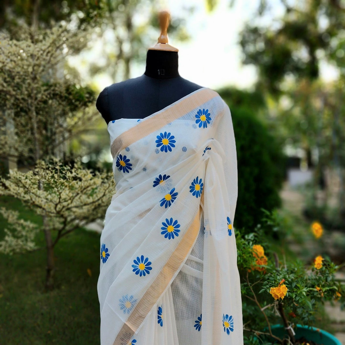 Graceful Hand-Painted Floral Saree On Airy Kota Doria Weave