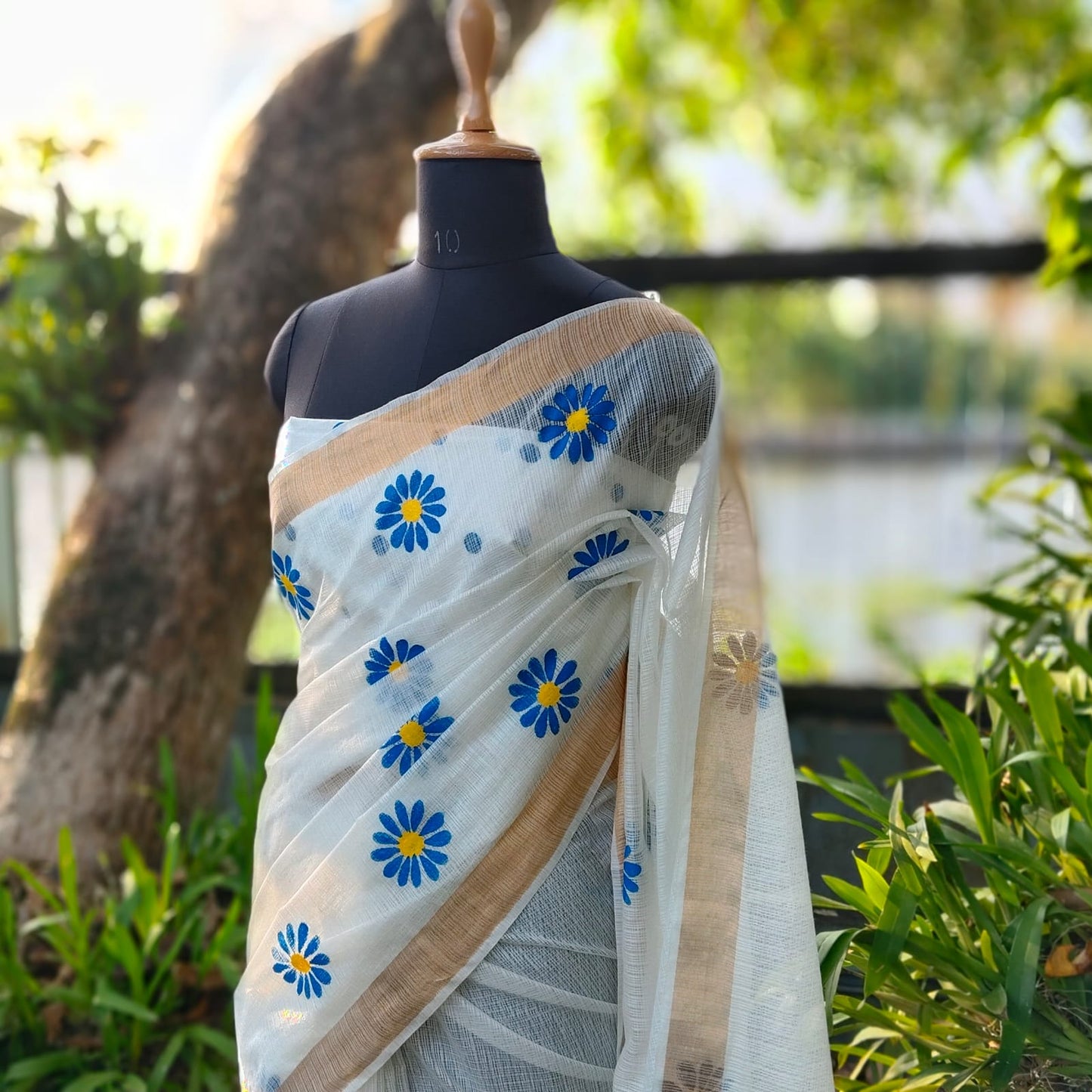 Graceful Hand-Painted Floral Saree On Airy Kota Doria Weave
