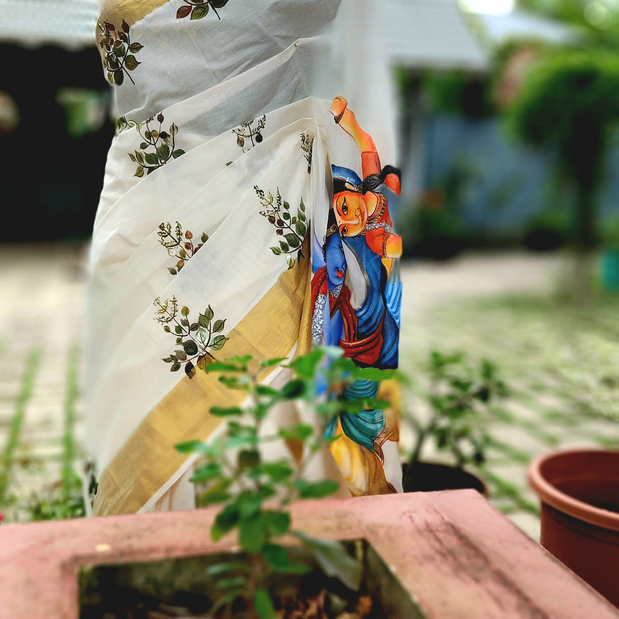 Divine Radha Krishna And Tulsi Hand-Painted On a Classic Kasavu Drape