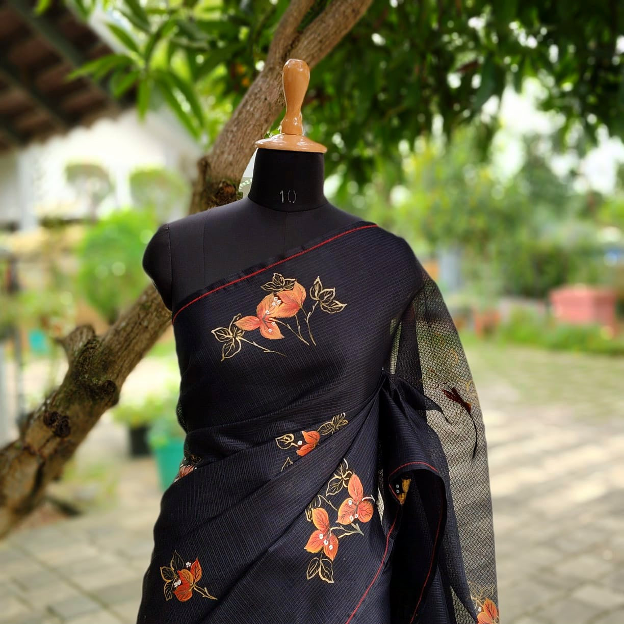 Graceful Bougainvillaeas In Antique Style Bloom Across This Soft Kota Silk Saree