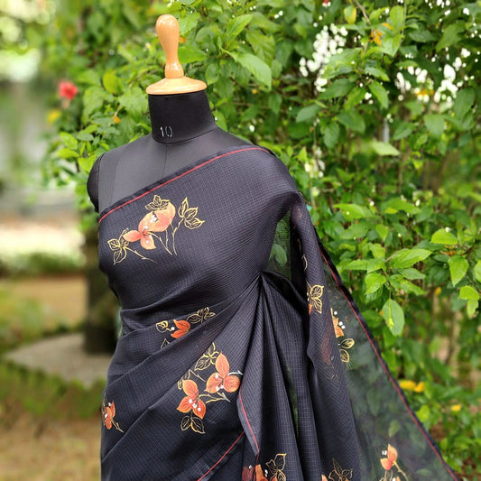 Graceful Bougainvillaeas In Antique Style Bloom Across This Soft Kota Silk Saree
