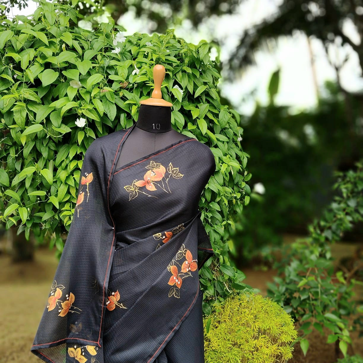 Graceful Bougainvillaeas In Antique Style Bloom Across This Soft Kota Silk Saree