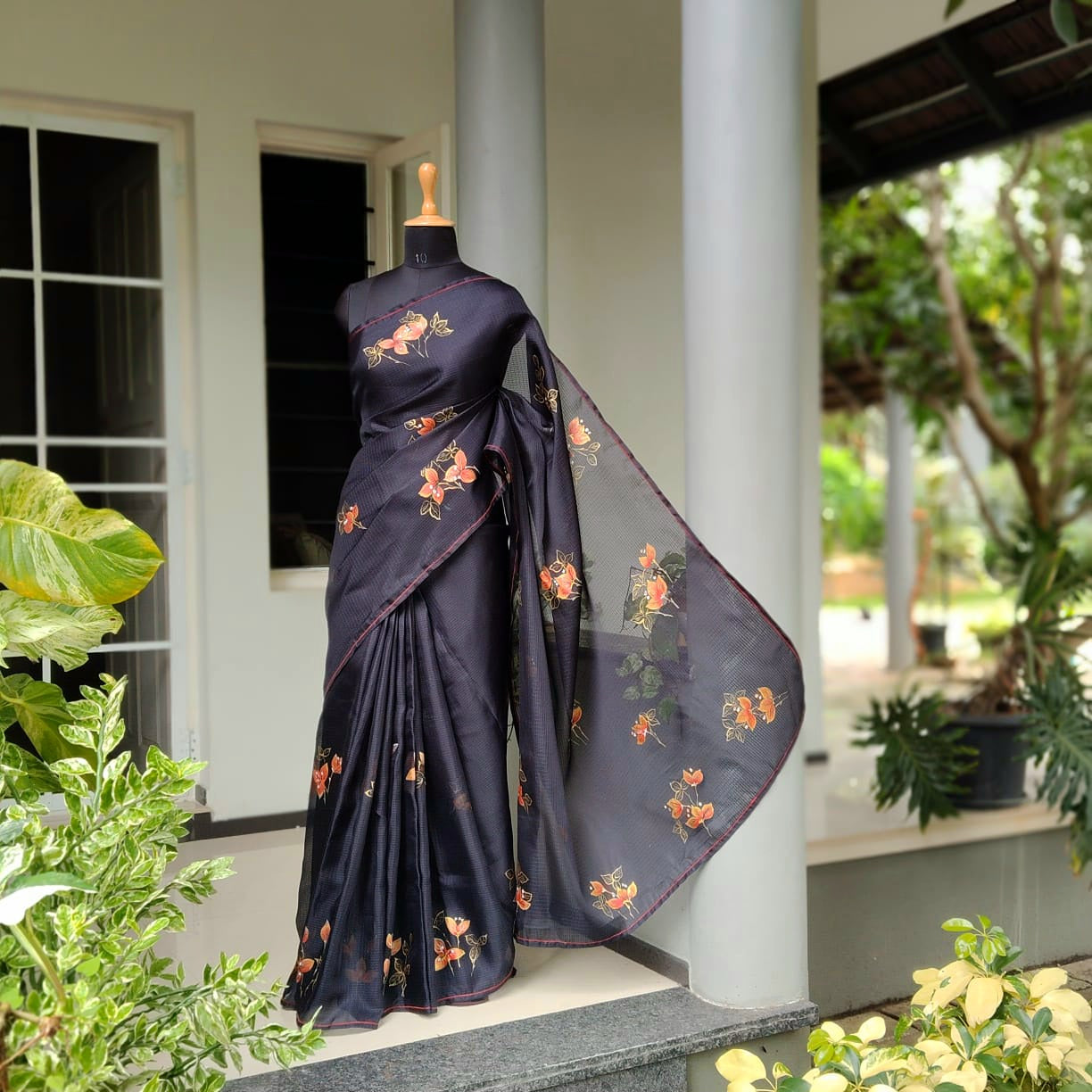 Graceful Bougainvillaeas In Antique Style Bloom Across This Soft Kota Silk Saree