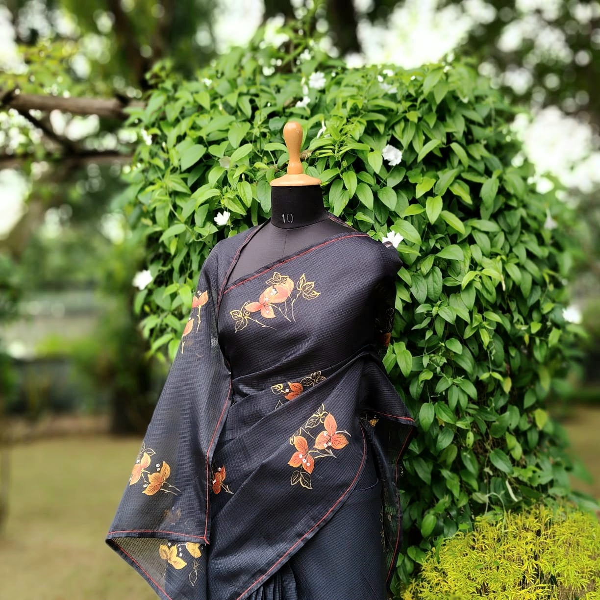 Graceful Bougainvillaeas In Antique Style Bloom Across This Soft Kota Silk Saree