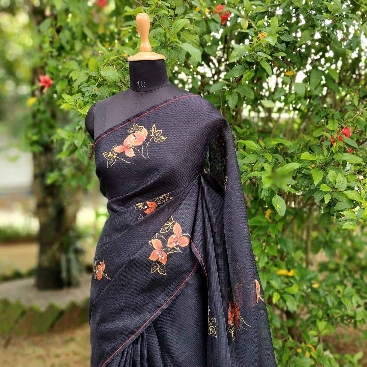 Graceful Bougainvillaeas In Antique Style Bloom Across This Soft Kota Silk Saree