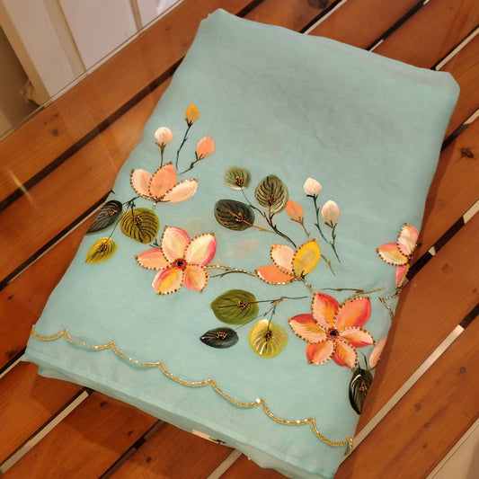 Dreamy Blue Silk Organza Saree With Plumeria Blossoms Painted For A Timeless Look