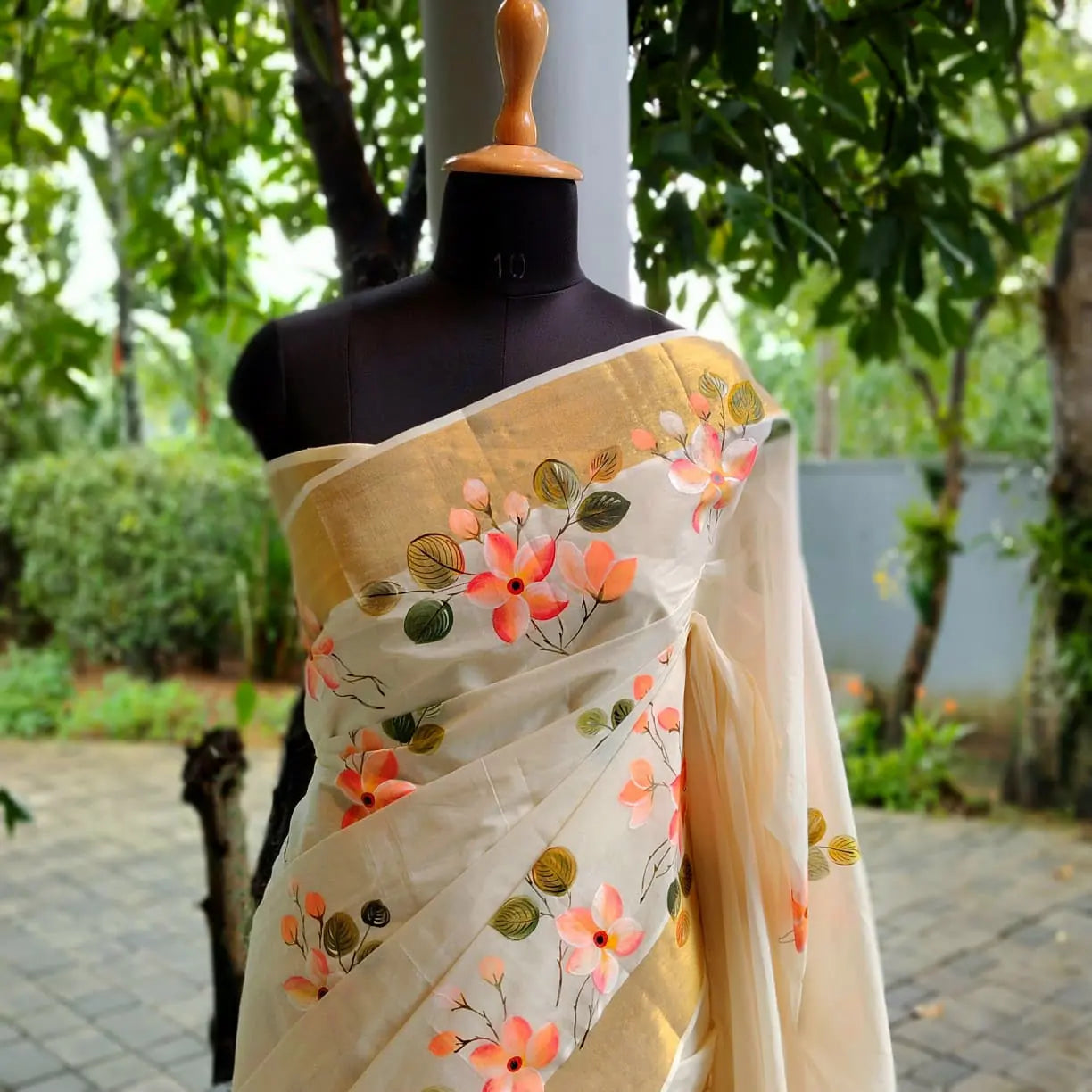 Graceful Kerala Saree With Hand-Painted Plumerias