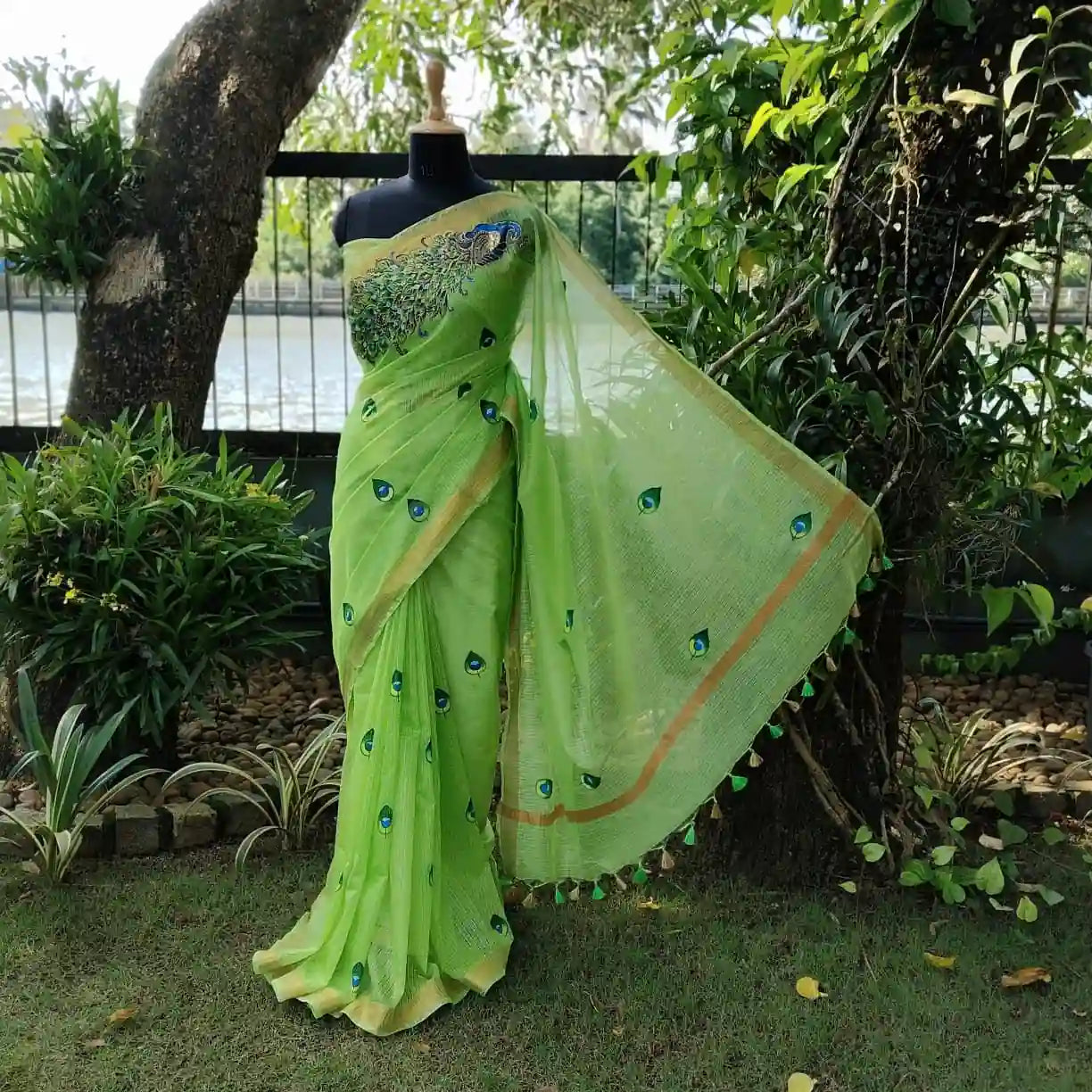 Graceful Hand-Painted Peacock Motif On soft Kota Doria Saree