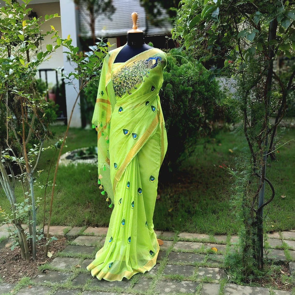 Graceful Hand-Painted Peacock Motif On soft Kota Doria Saree