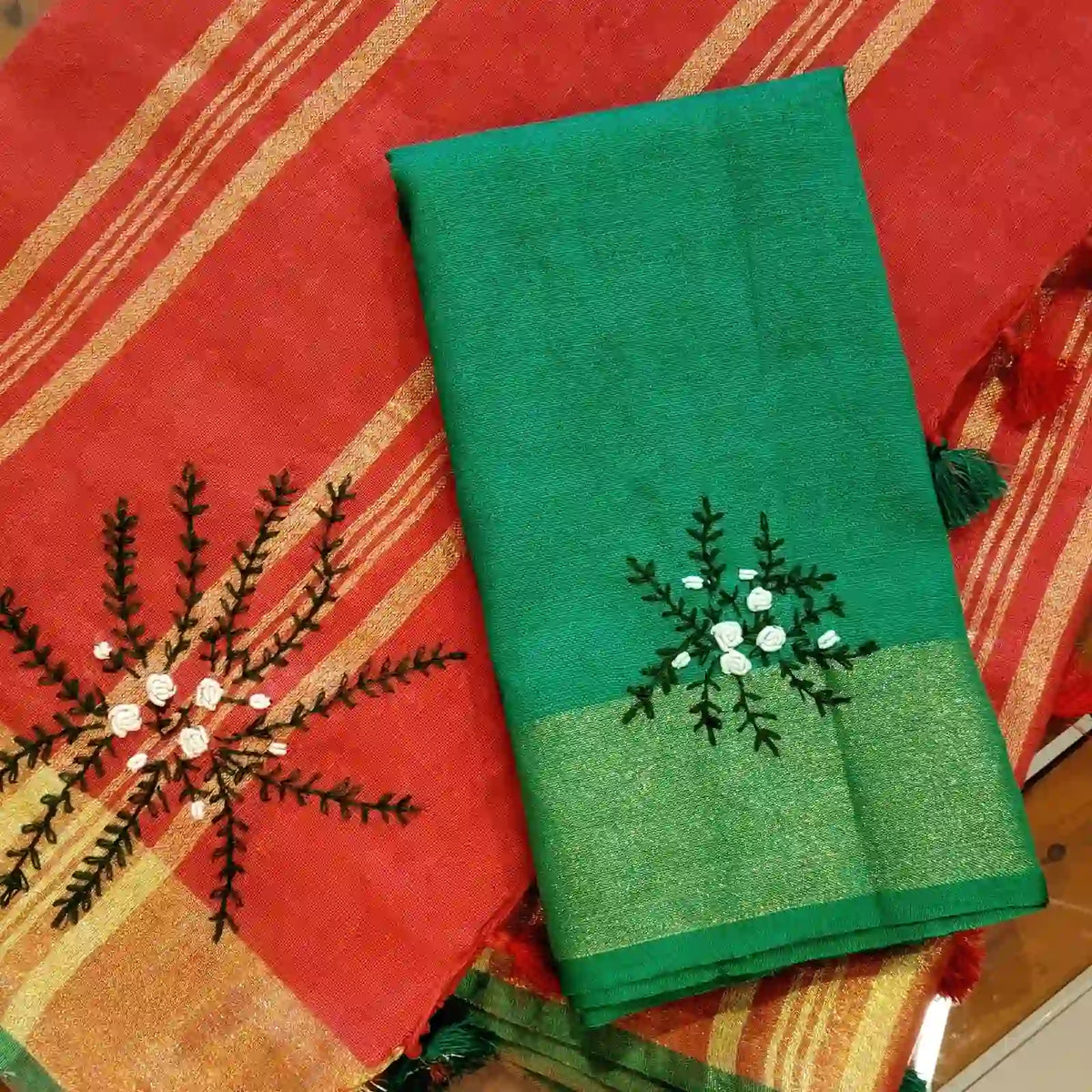 A linen Saree Graced With Hand-Embroidered Elegance