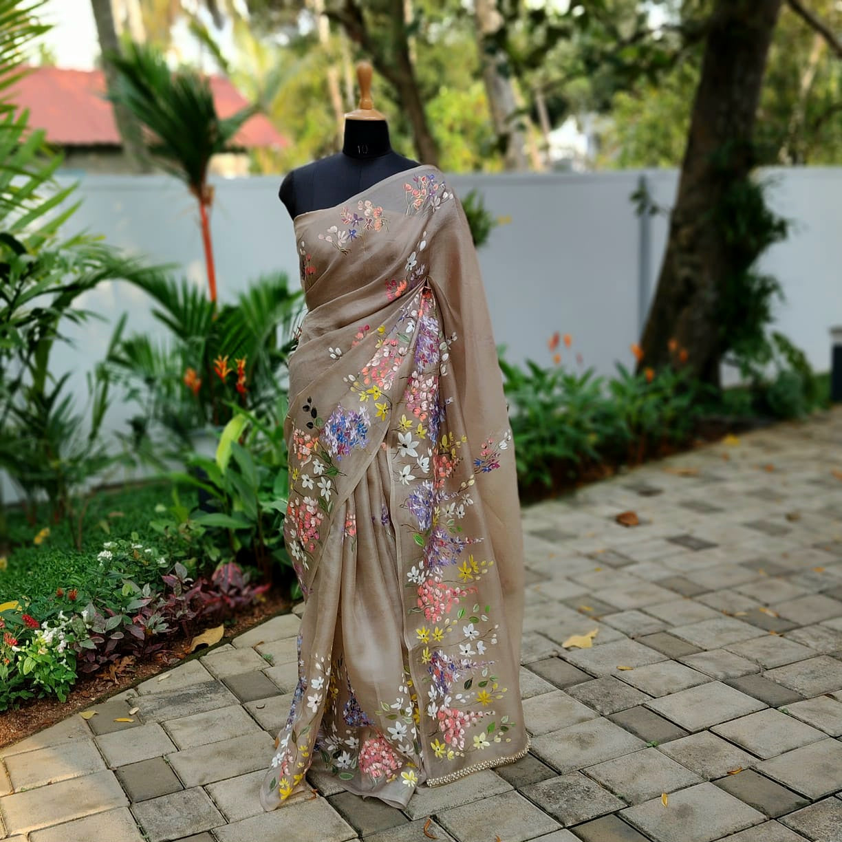 A Dreamy Pure Silk Organza Saree Adorned With Hand-Painted Wild Blooms