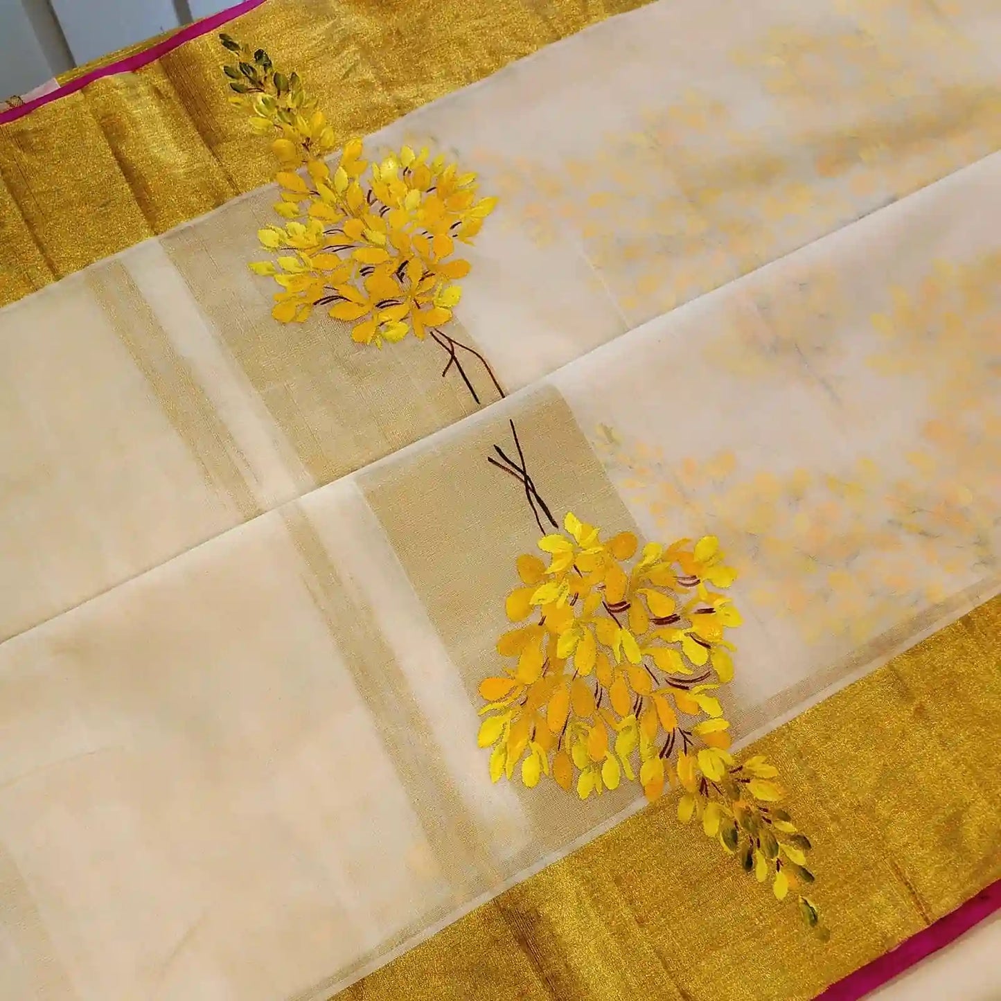 Graceful Kani Konna Florals on Kerala Kasavu -Subtle, Intricate, Timeless