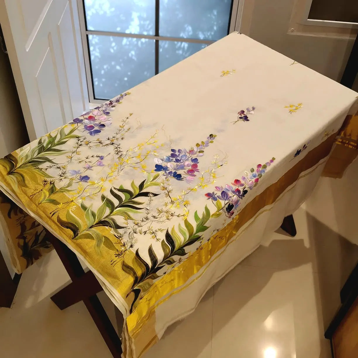 Unique Pure Handloom Kerala Kasavu Saree Hand-Painted With Delicate Wild Blossoms.