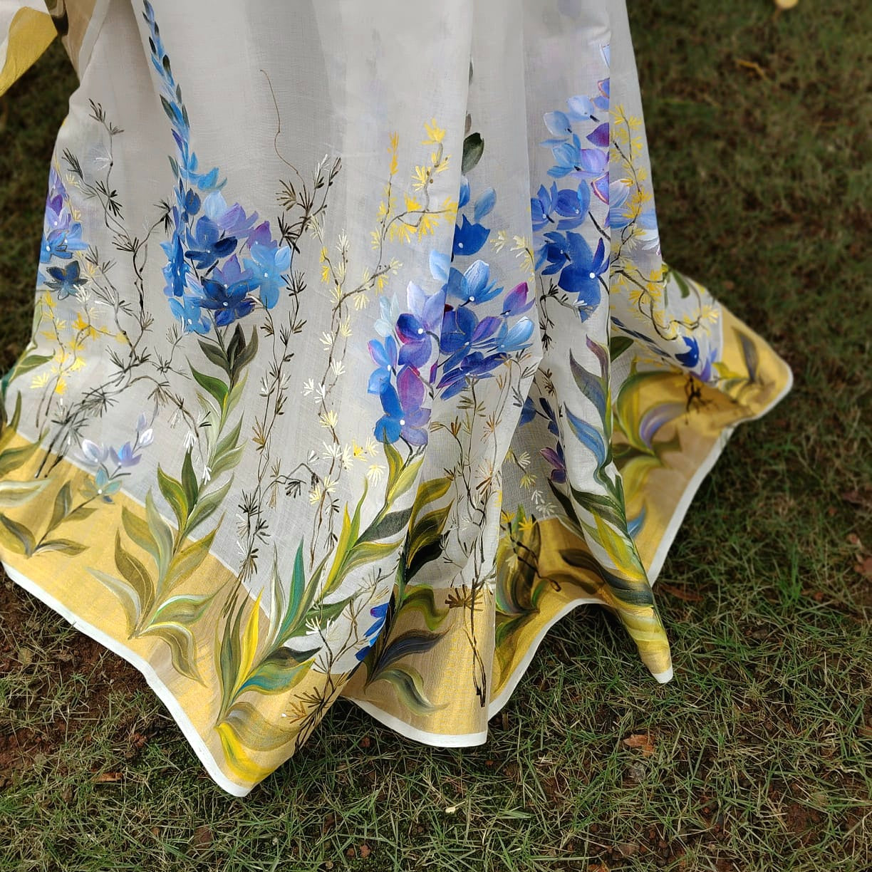 Unique Pure Handloom Kerala Kasavu Saree Hand-Painted With Delicate Wild Blossoms.