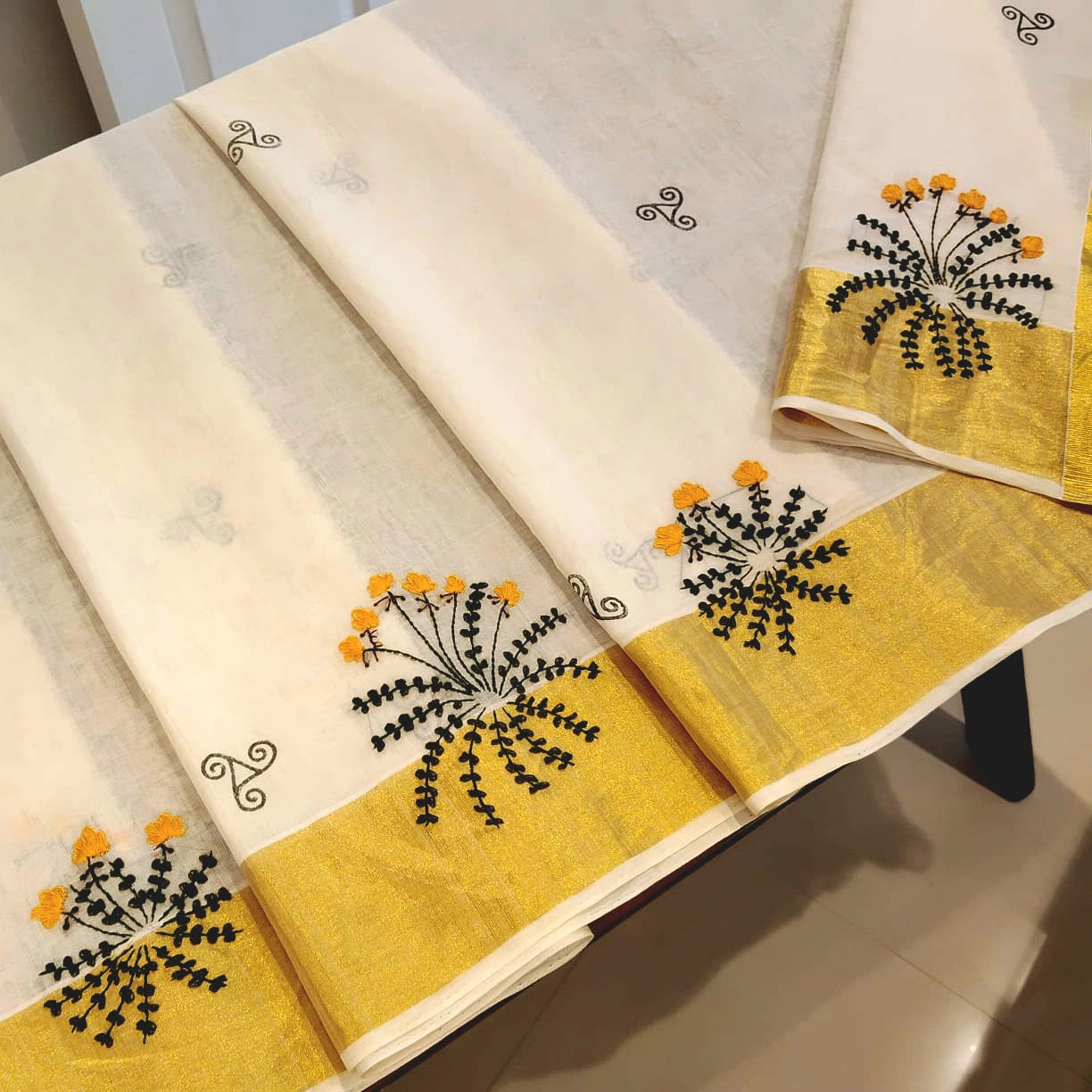 Elegant Kerala Kasavu Handloom Saree Adorned With Fne Hand Embroidery And Block Printing