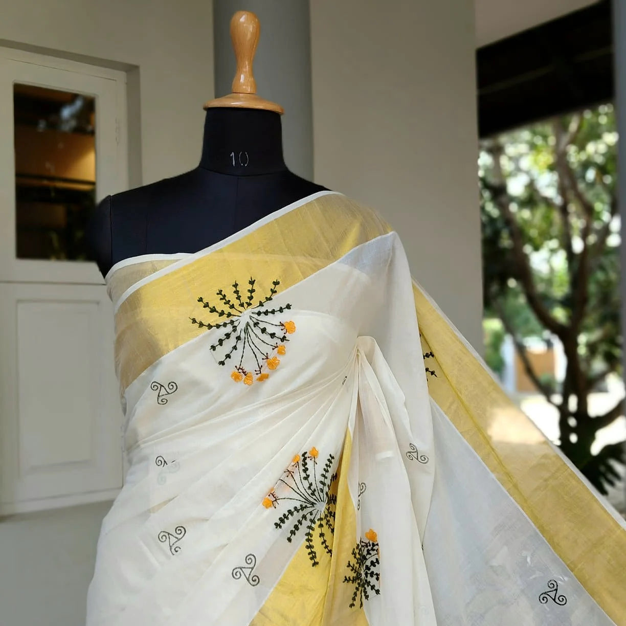 Elegant Kerala Kasavu Handloom Saree Adorned With Fne Hand Embroidery And Block Printing