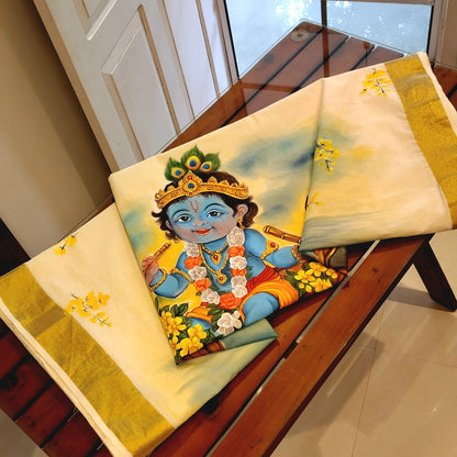 Traditional Kerala Kasavu Saree With A Beautifully Hand-Painted Baby Krishna Motif.