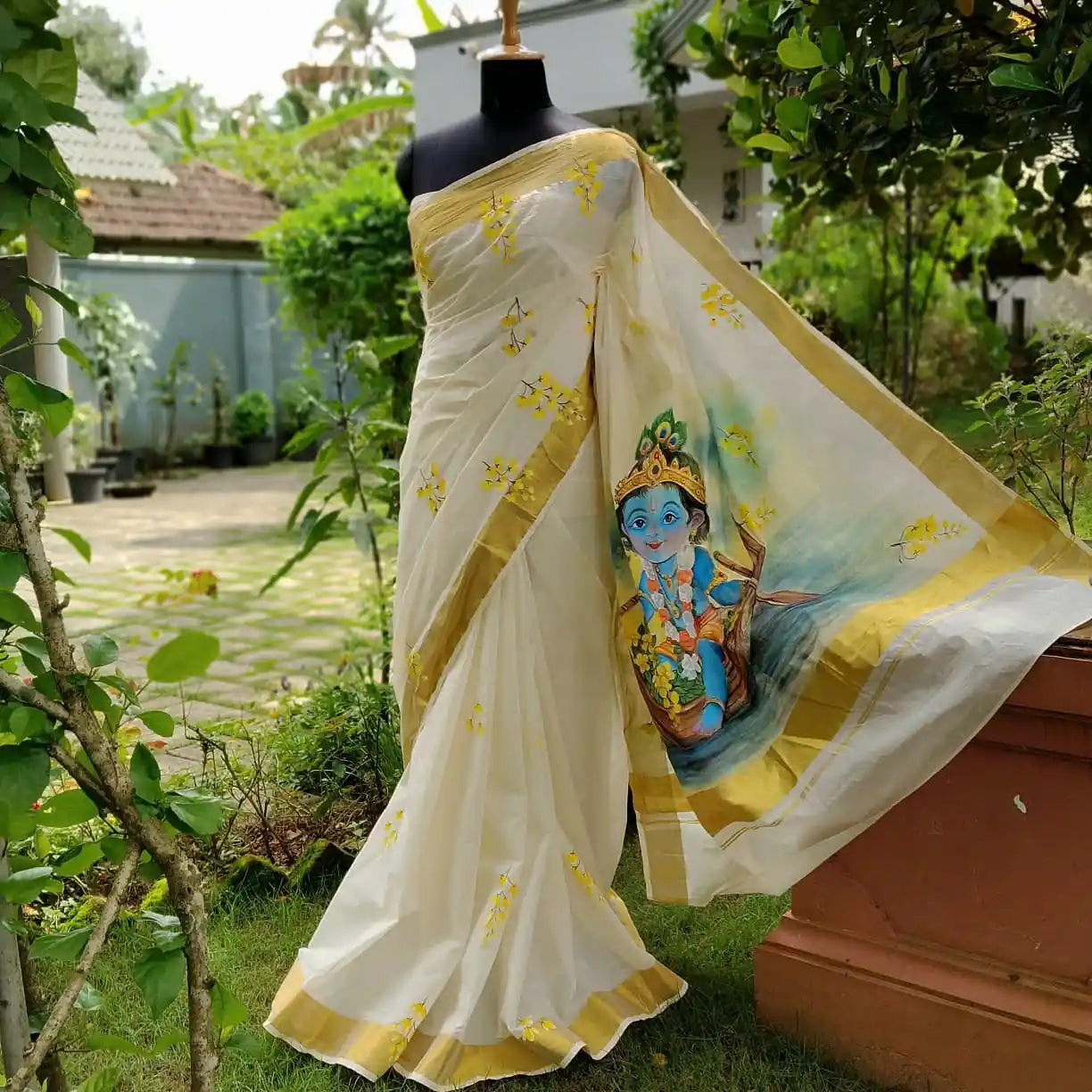 Traditional Kerala Kasavu Saree With A Beautifully Hand-Painted Baby Krishna Motif.