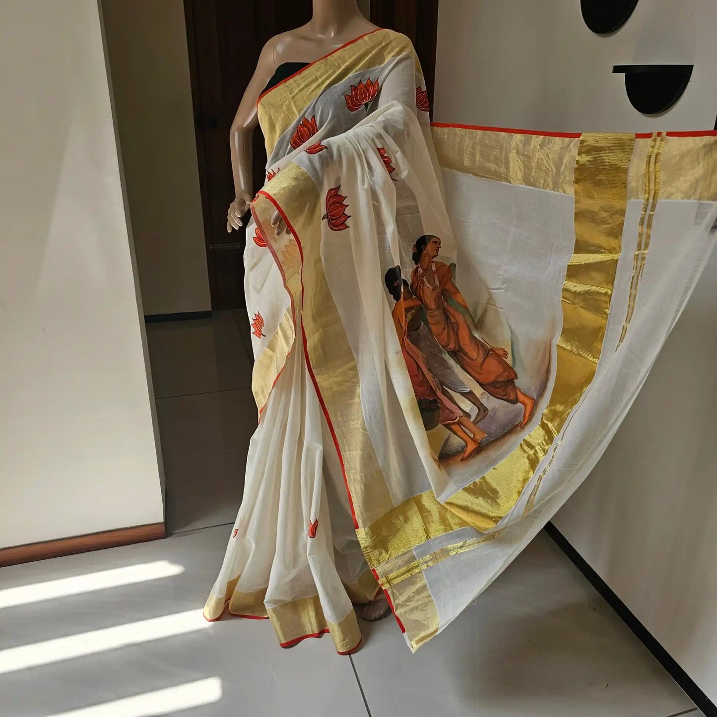 Hand-painted Kerala saree featuring Ravi Varma artwork