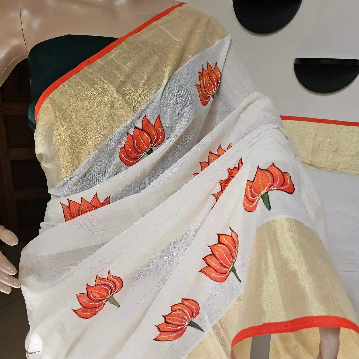 Hand-painted Kerala saree featuring Ravi Varma artwork