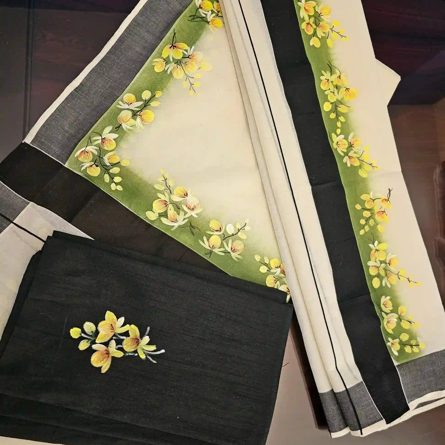 Kani Konnas hand painted on Kerala Set Mundu