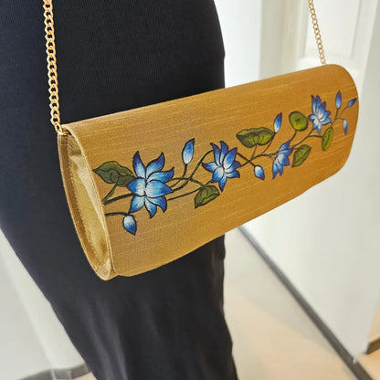 Hand-Painted Dark Beige clutch with Blue Lotus in Mural Style.