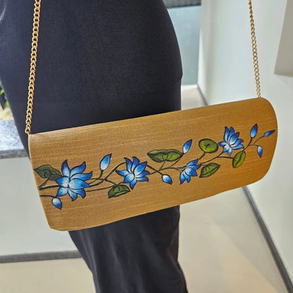 Hand-Painted Dark Beige clutch with Blue Lotus in Mural Style.