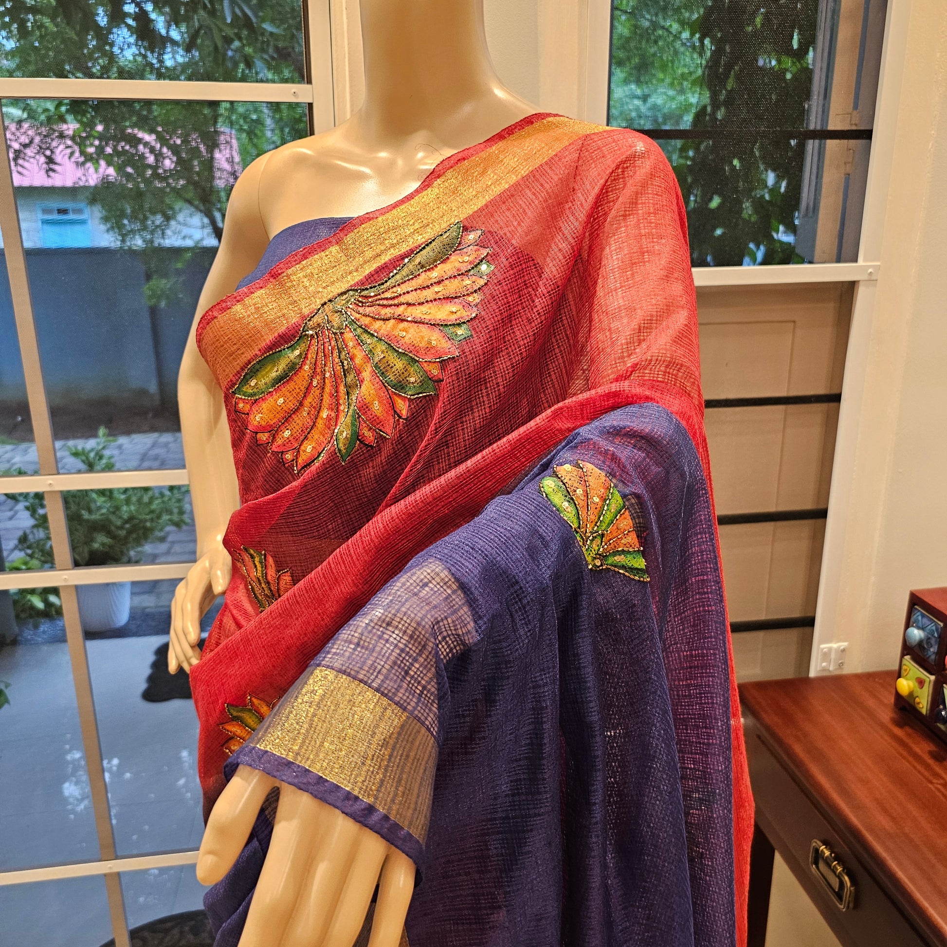 Intricate hand-painted saree