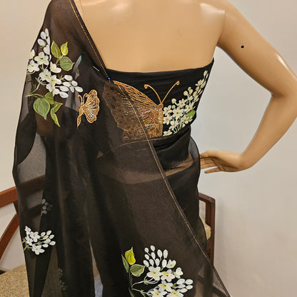 Stunning Black Organza Saree Adorned with Jasmine Flowers And Fluttering Butterflies