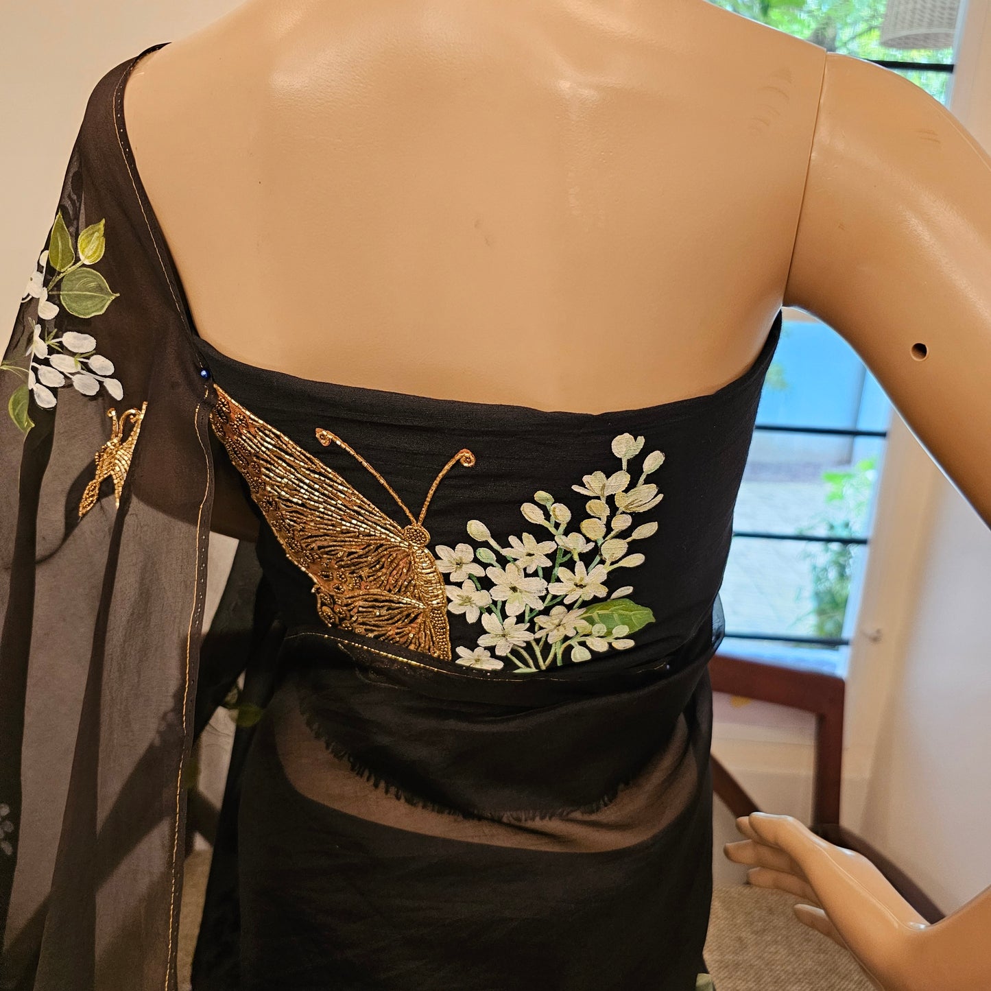 Stunning Black Organza Saree Adorned with Jasmine Flowers And Fluttering Butterflies