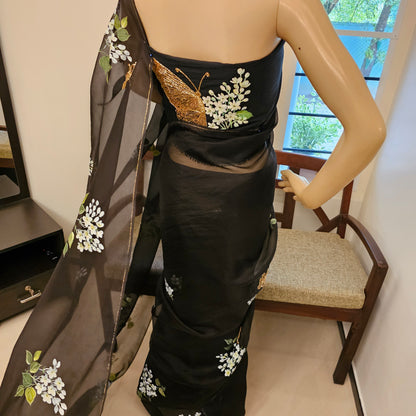 Stunning Black Organza Saree Adorned with Jasmine Flowers And Fluttering Butterflies