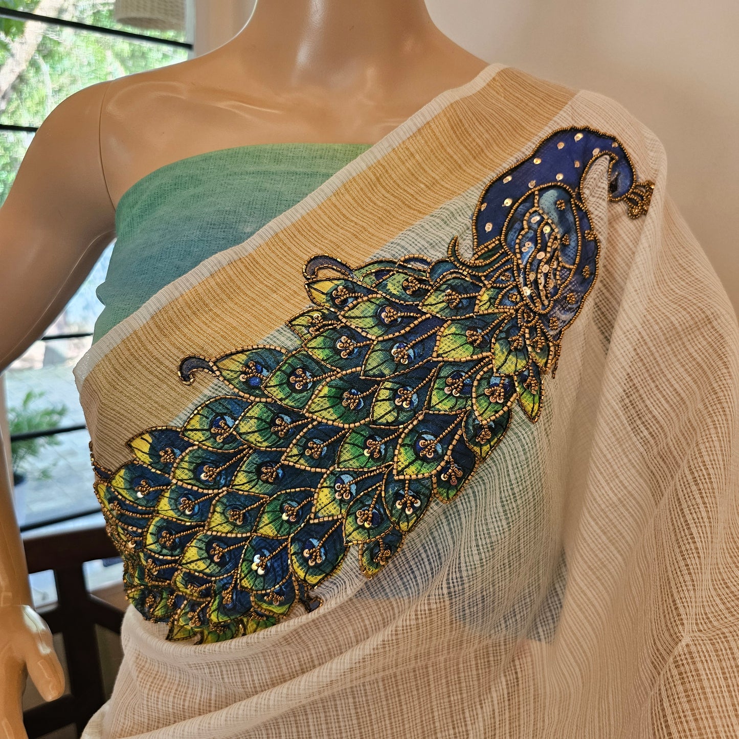 Pretty Hand-Painted Kota Doria Saree with Sequin Work