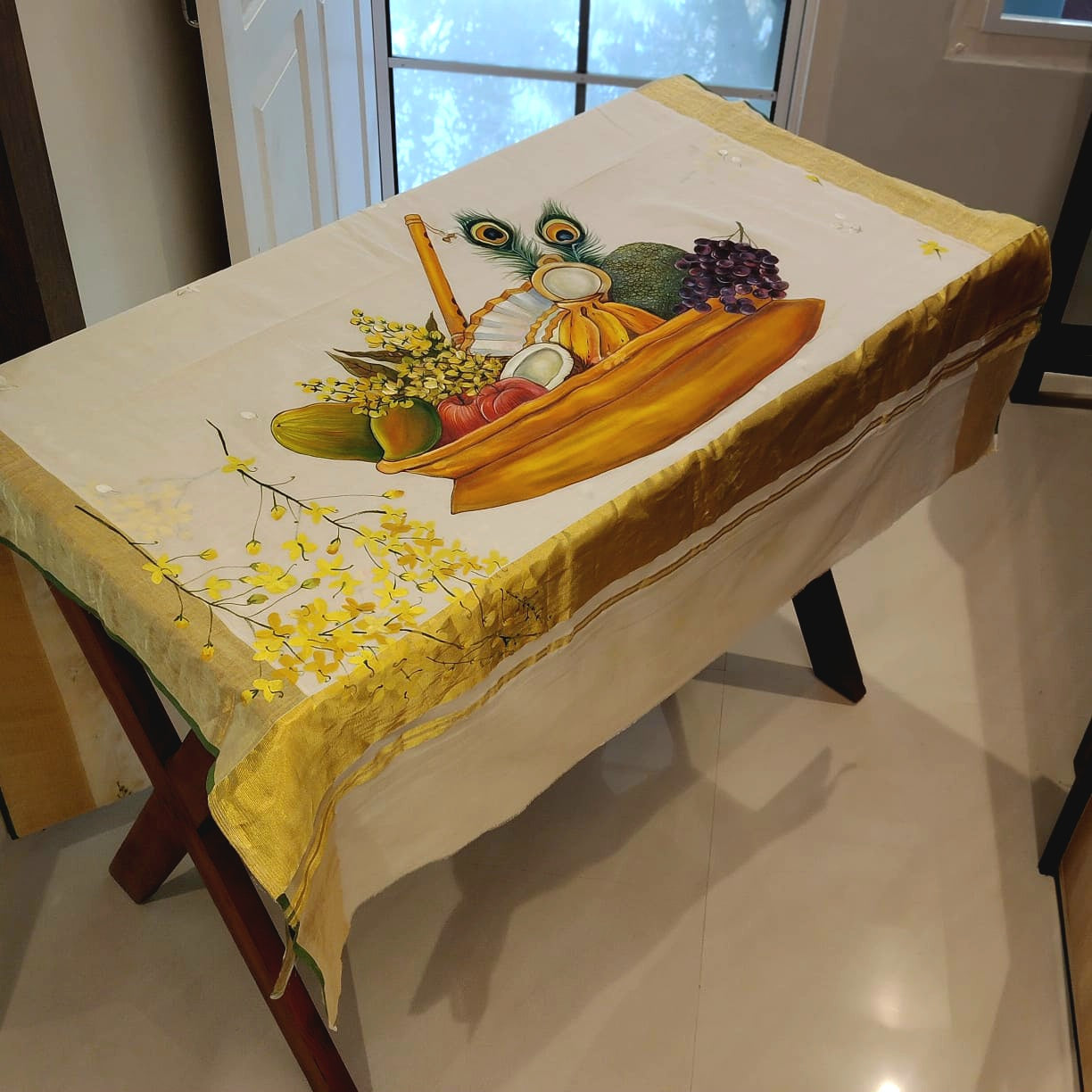 Hand-Painted Vishu Kani On Handloom Kasavu Saree