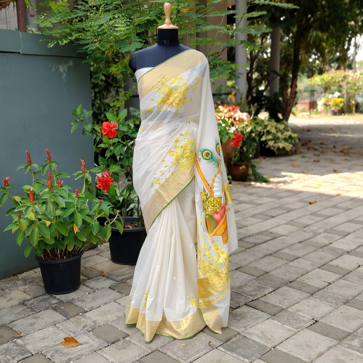 Hand-Painted Vishu Kani On Handloom Kasavu Saree