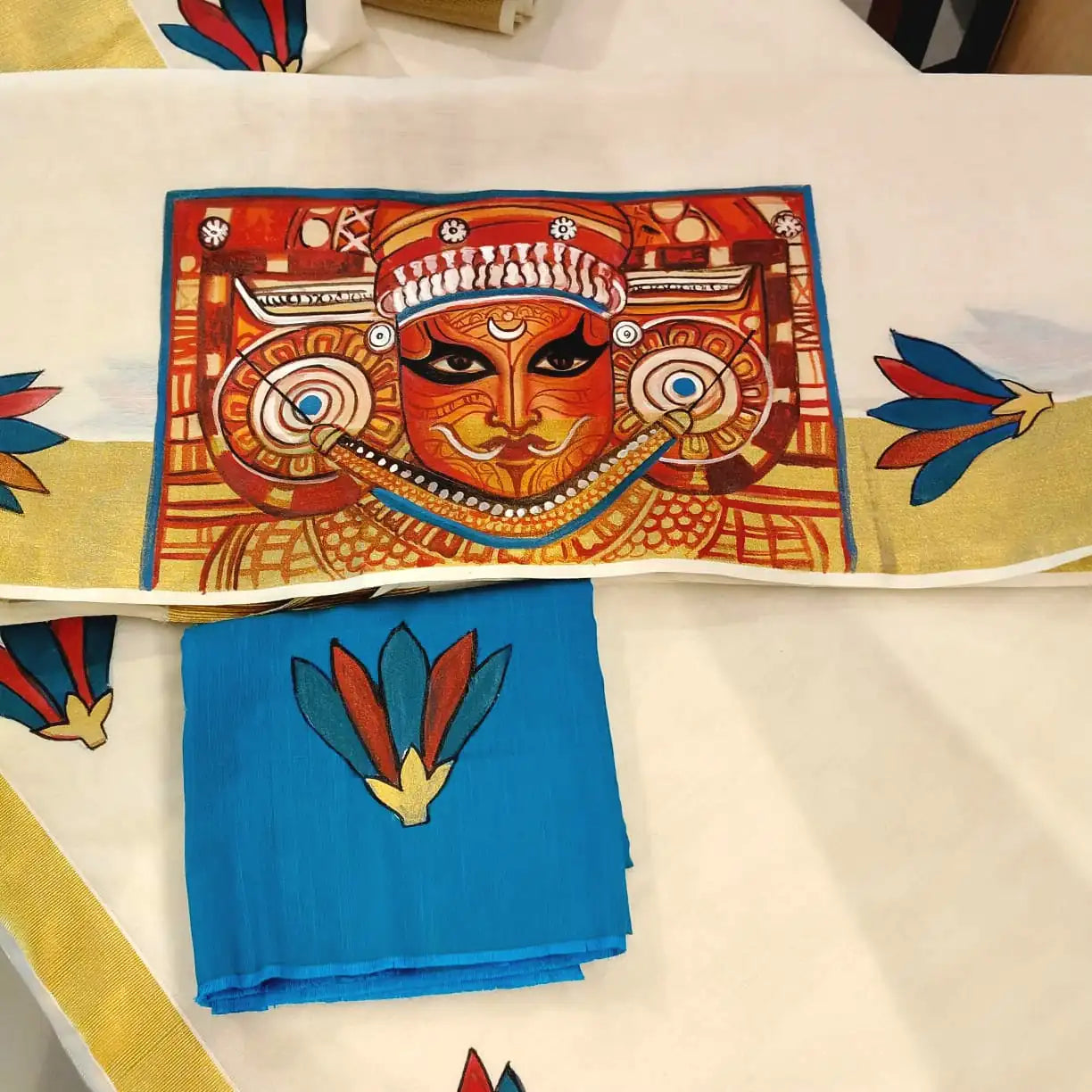 Exquisite Hand-Painted Theyyam Splendour