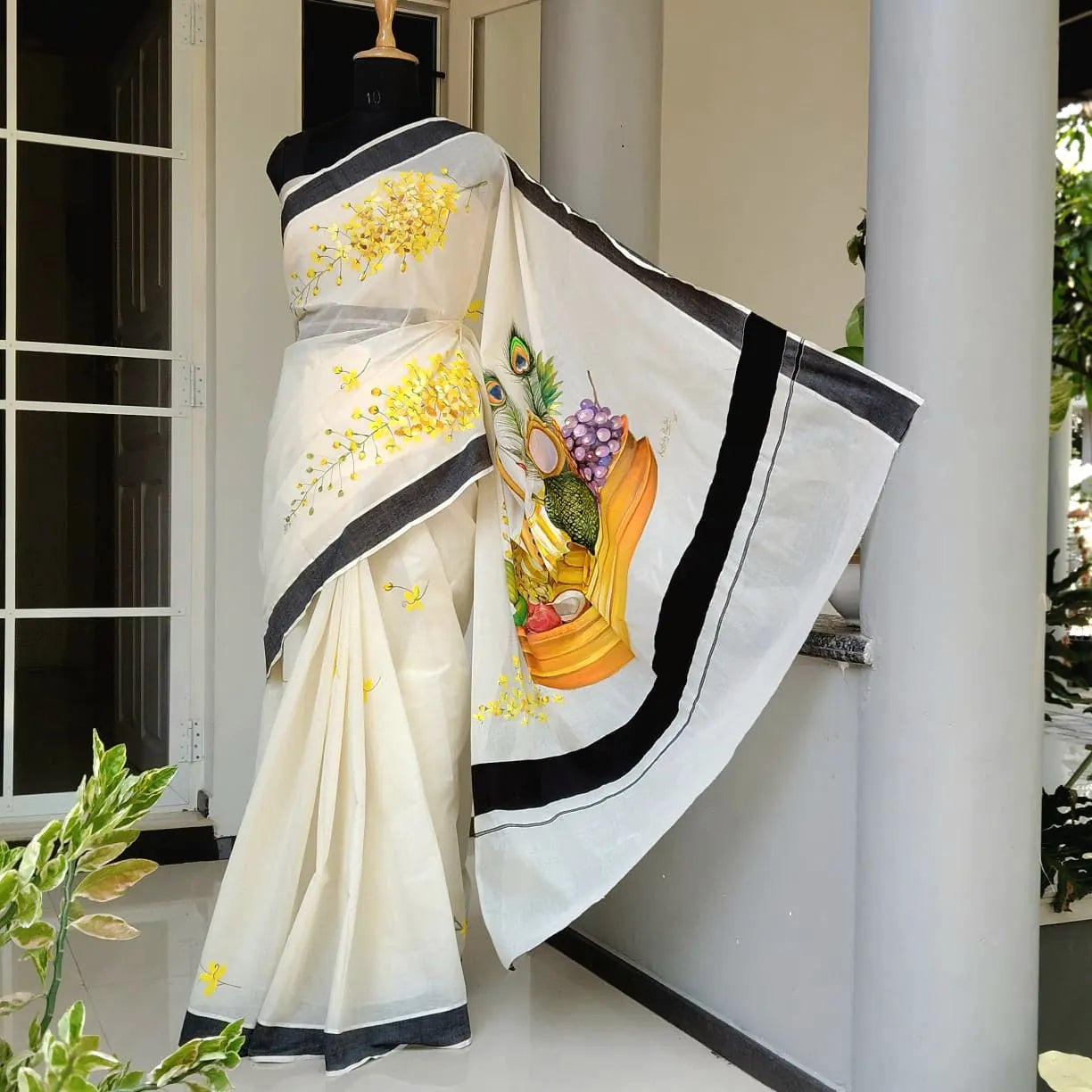 Hand-Painted Kerala Saree with Vishu Themed Motif