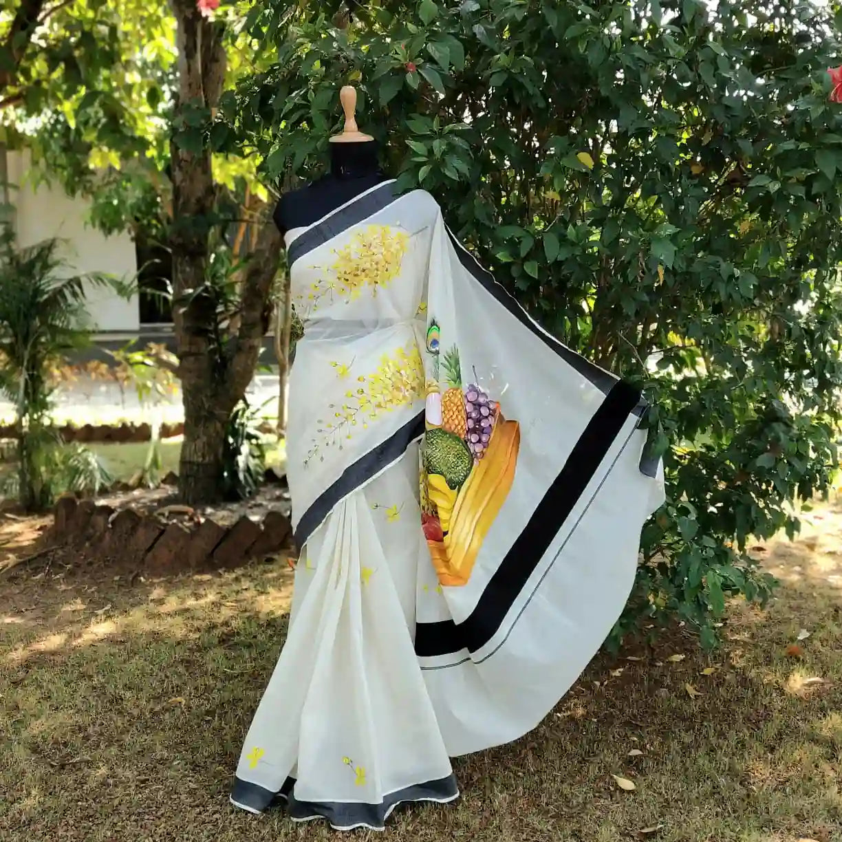 Hand-Painted Kerala Saree with Vishu Themed Motif