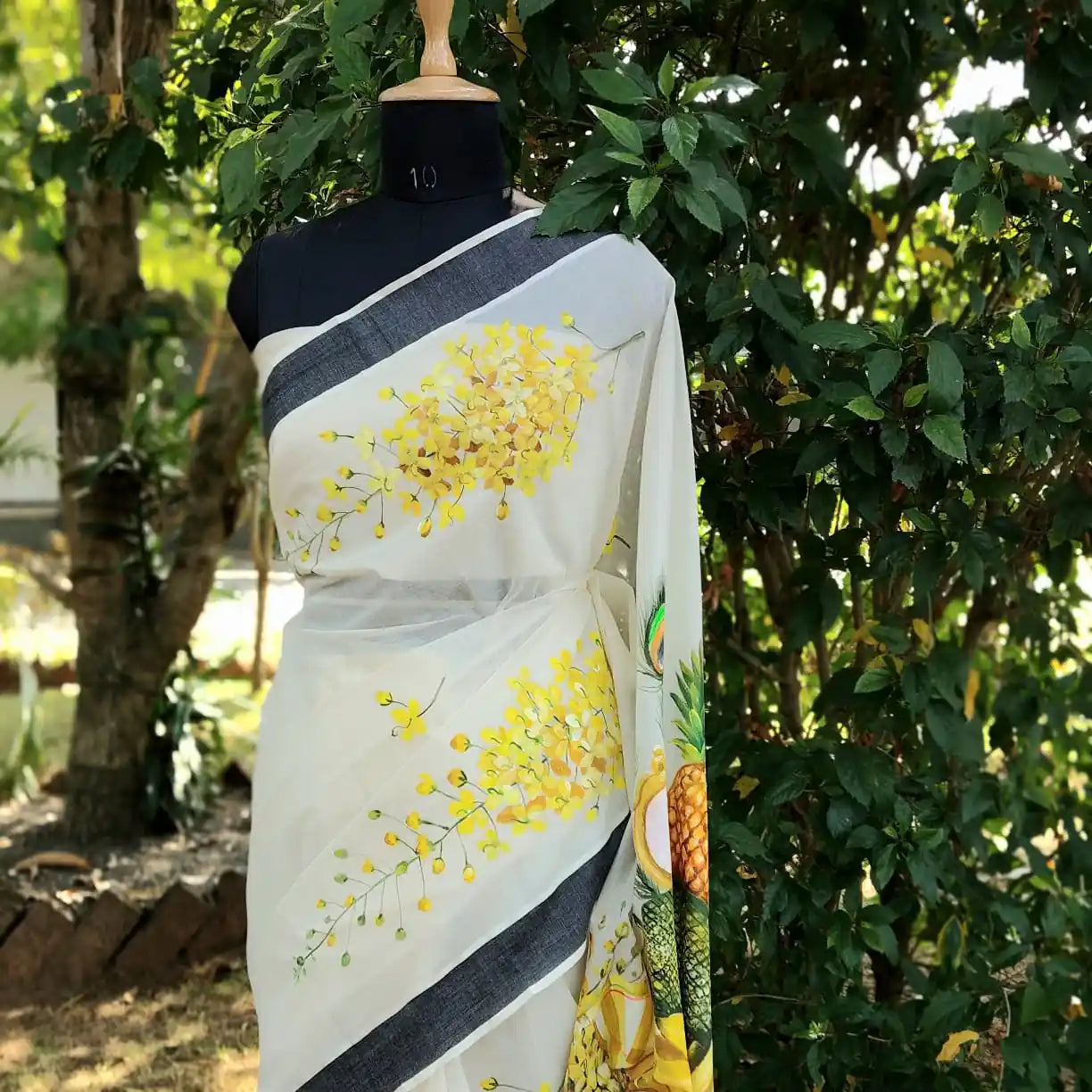 Hand-Painted Kerala Saree with Vishu Themed Motif