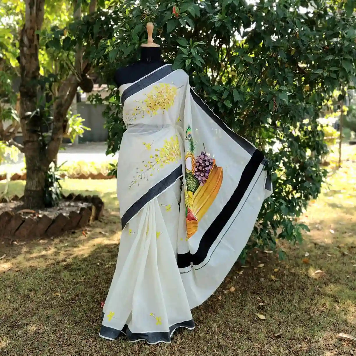 Hand-Painted Kerala Saree with Vishu Themed Motif
