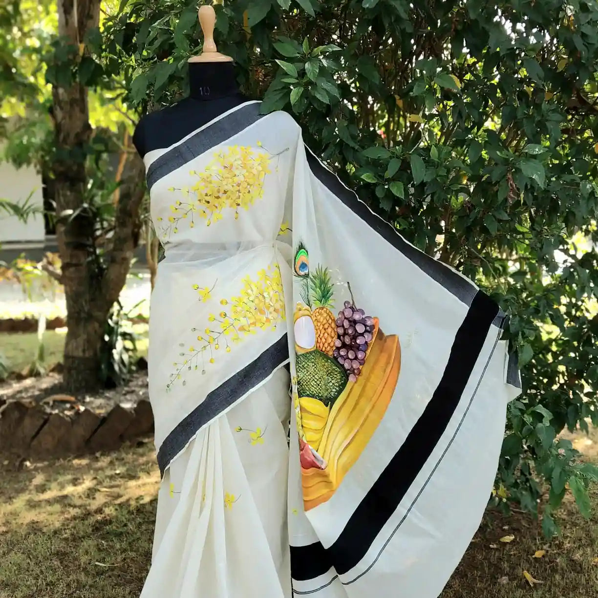 Hand-Painted Kerala Saree with Vishu Themed Motif