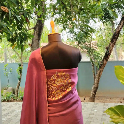 Graceful Onion Pink Uppada Silk Saree Adorned with Hand-Painted Art & Sparkling Sequin Details