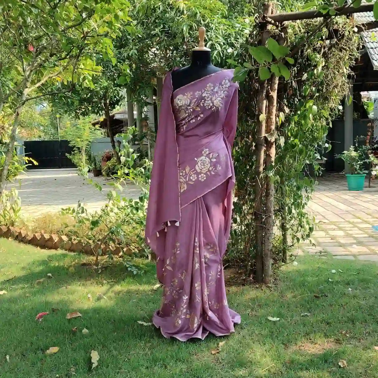 Graceful Onion Pink Uppada Silk Saree Adorned with Hand-Painted Art & Sparkling Sequin Details
