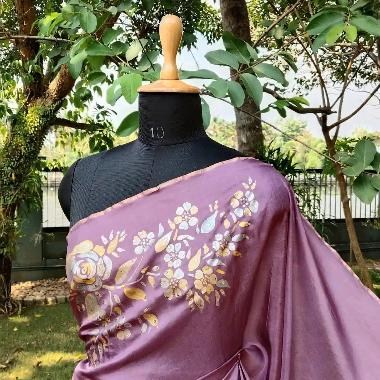 Graceful Onion Pink Uppada Silk Saree Adorned with Hand-Painted Art & Sparkling Sequin Details