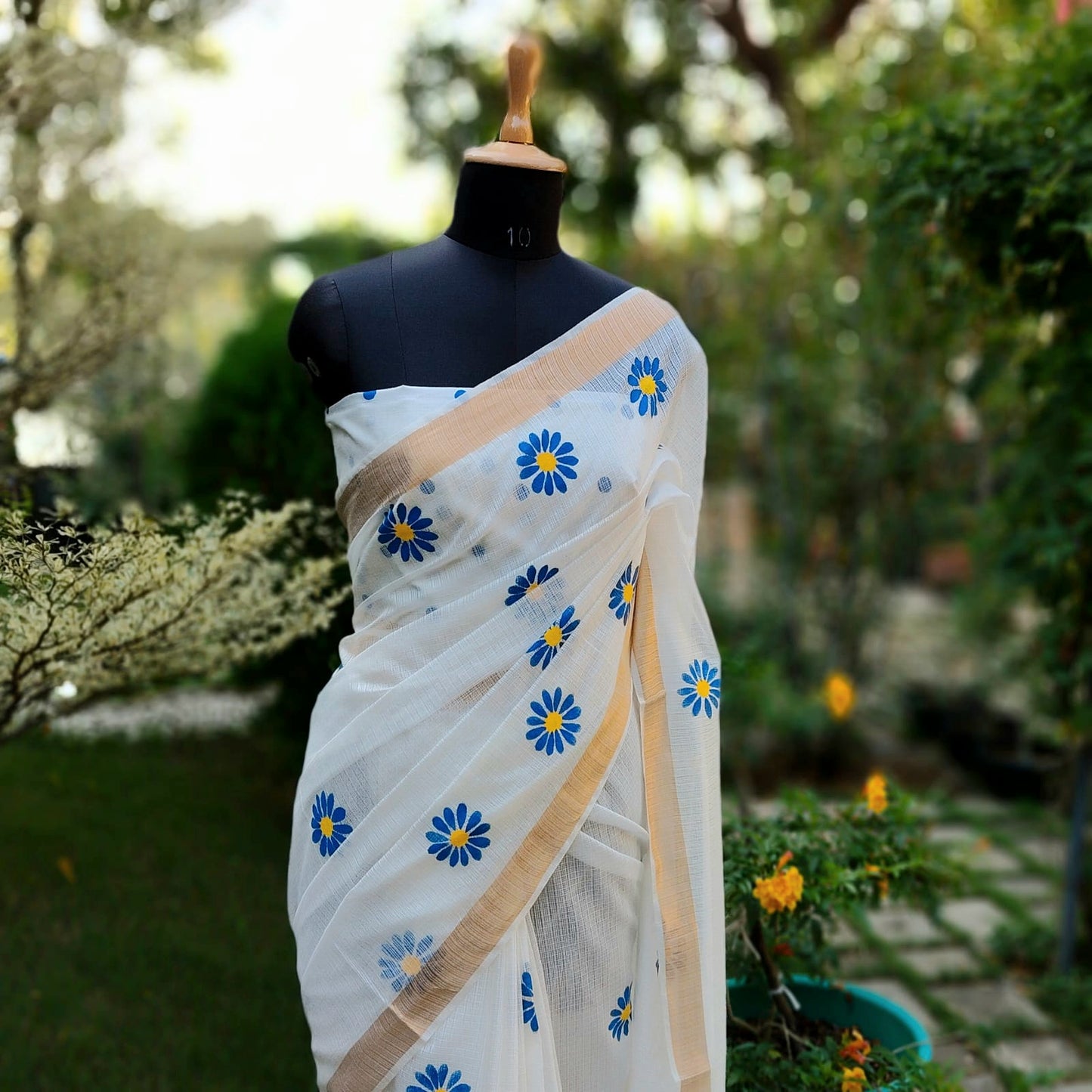 Graceful Hand-Painted Floral Saree On Airy Kota Doria Weave