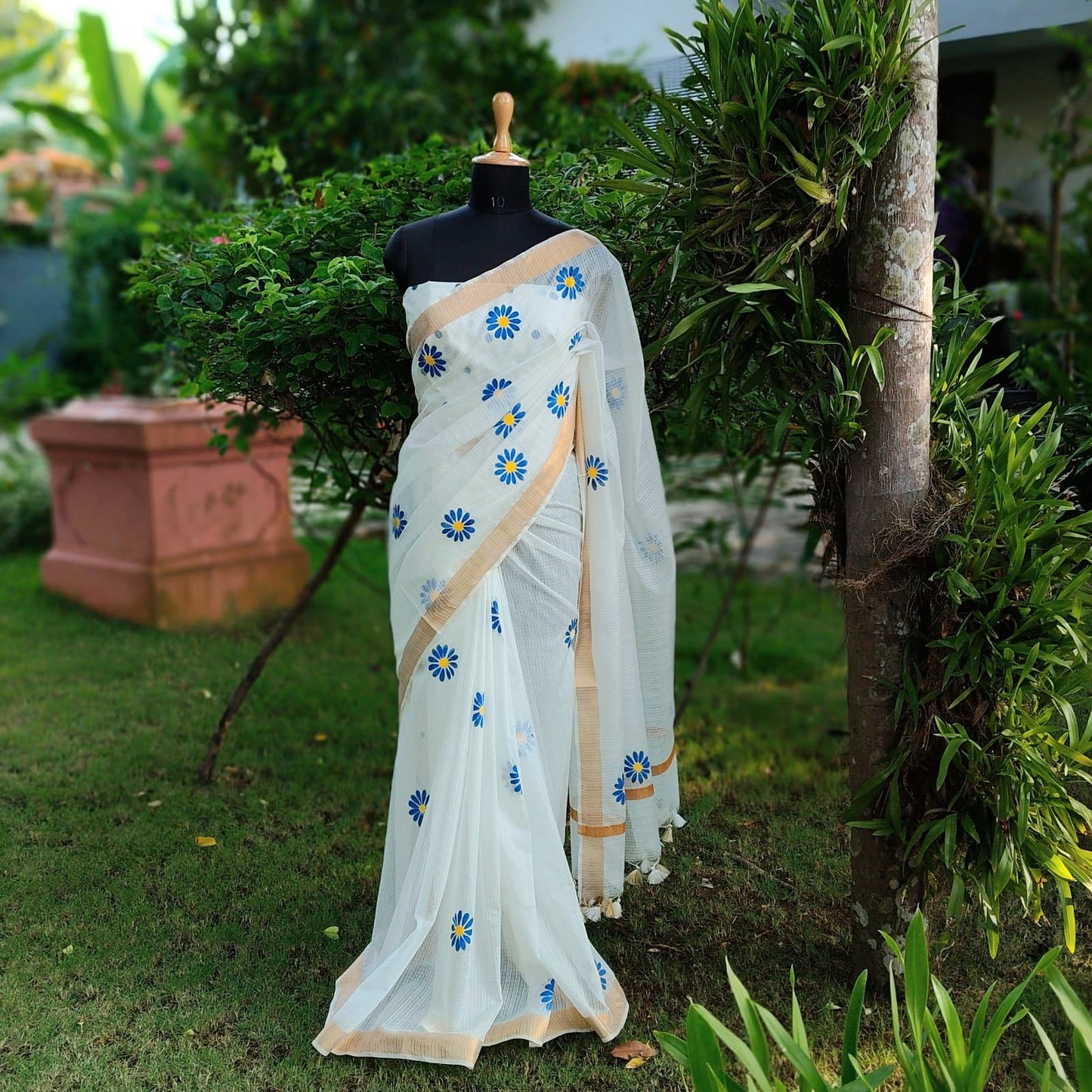 Graceful Hand-Painted Floral Saree On Airy Kota Doria Weave