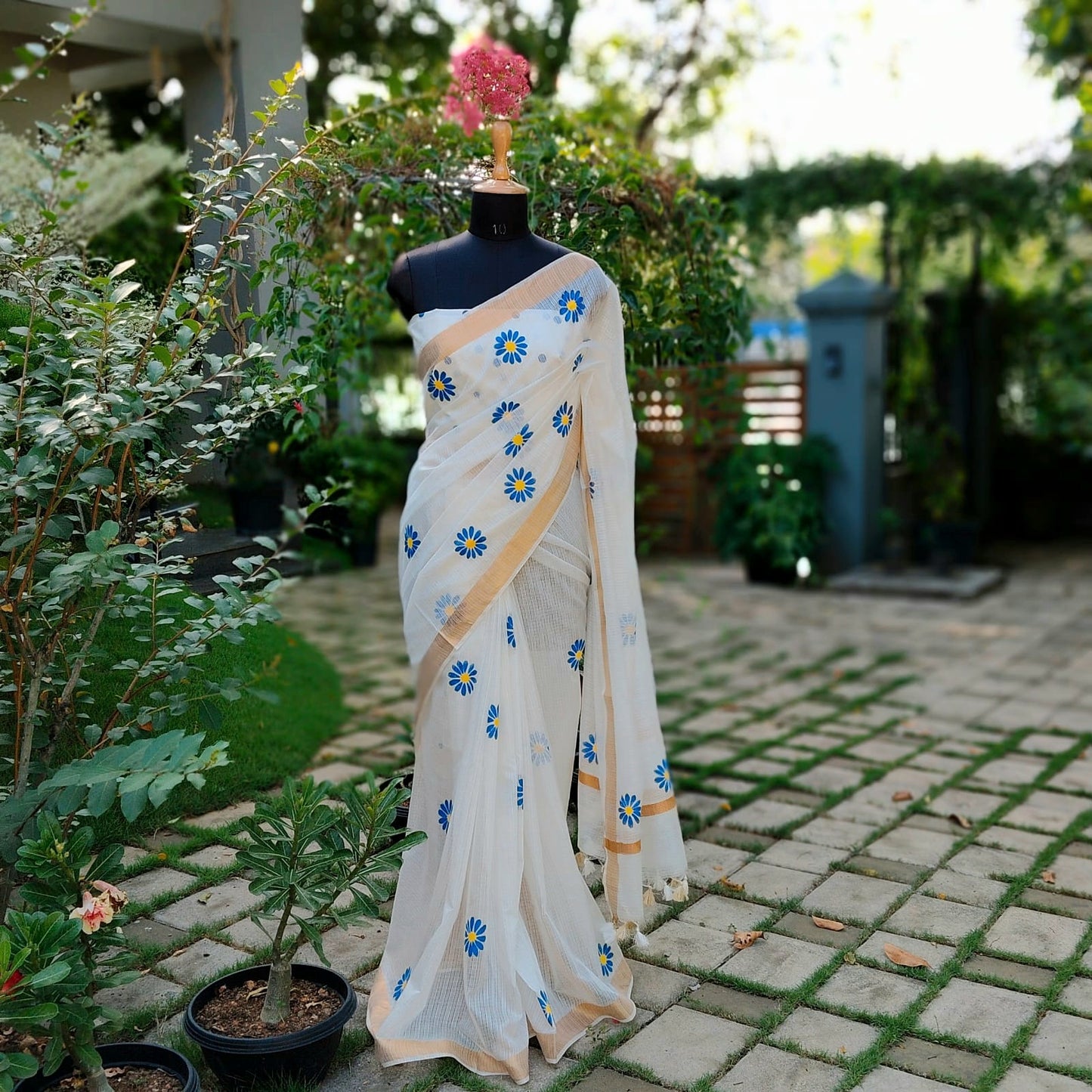 Graceful Hand-Painted Floral Saree On Airy Kota Doria Weave
